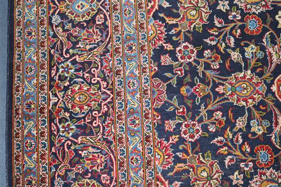 An Iranian Kashan carpet, 12ft 6in by 8ft 11in.